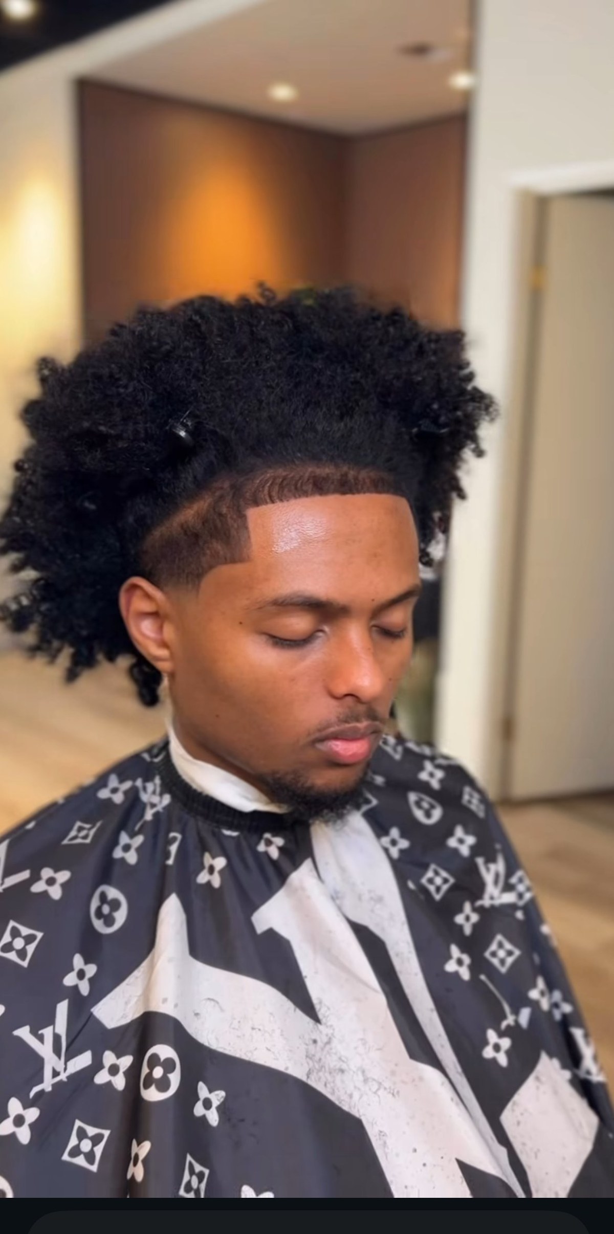 Tommy, founder of Culture Cuts, at the new Magnolia shop